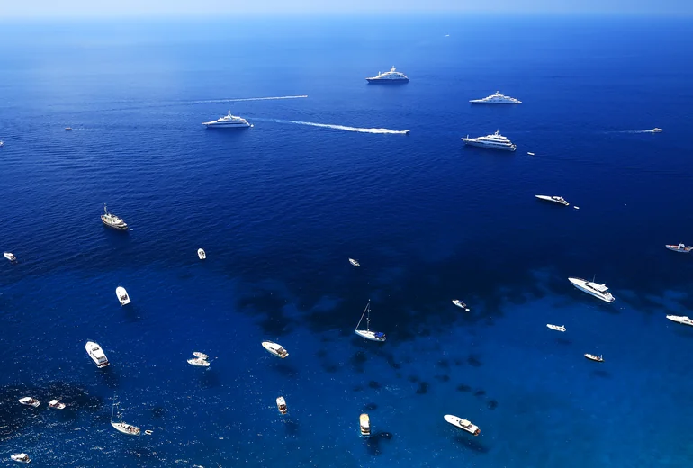 Catamaran deck with non-marking soft-soled deck shoes