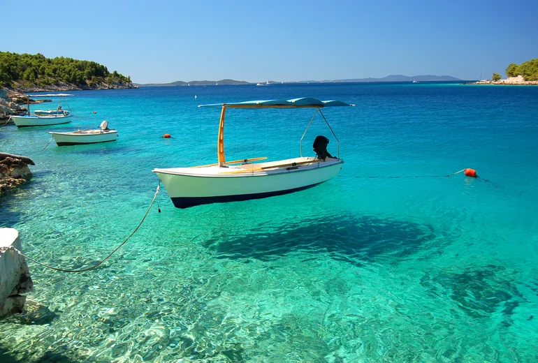 Catamaran at anchor in a Croatian National Park