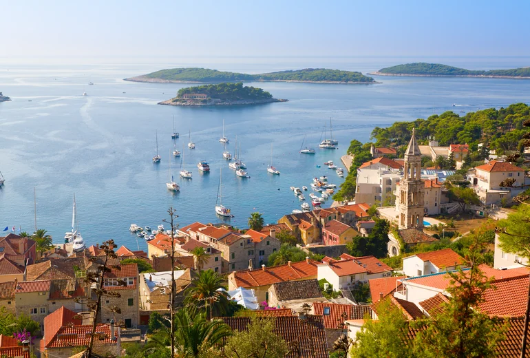 Croatian coastline with traditional stone village and harbour