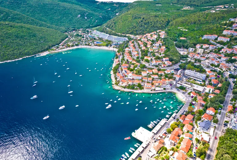 Croatian island bay with clear water and small village