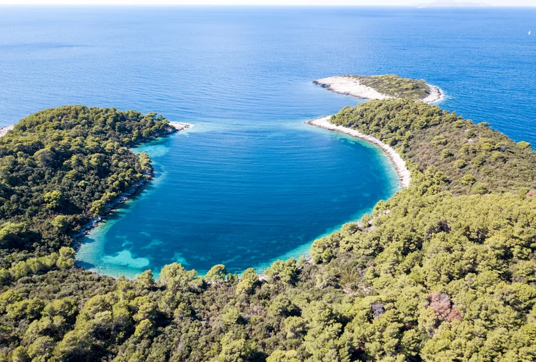 Croatian fishing village with stone houses on a small island