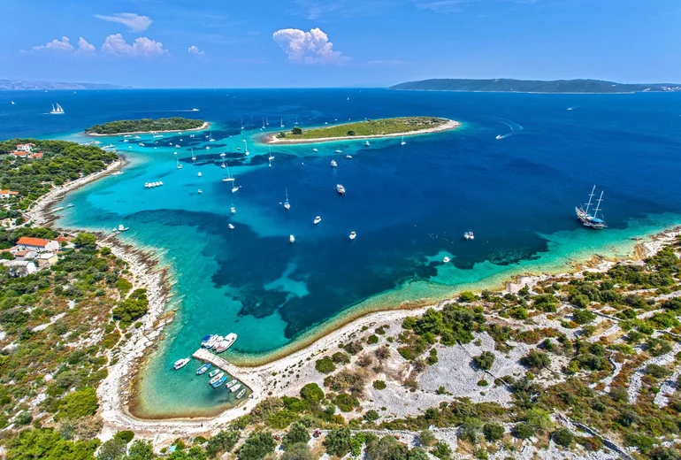 Pakleni Islands turquoise bays near Hvar town with anchored yachts